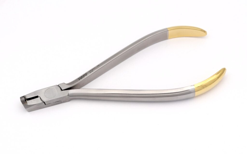 Universal cut and hold distal end cutter
